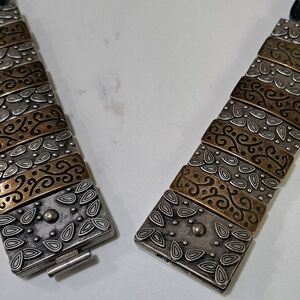 Elegant Silver and Gold Patterned Belt